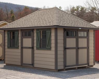 10x14 Hip Roofline Storage Shed With Clay Horizontal Shiplap Siding, Bronze Trim, and Avocado Shutters