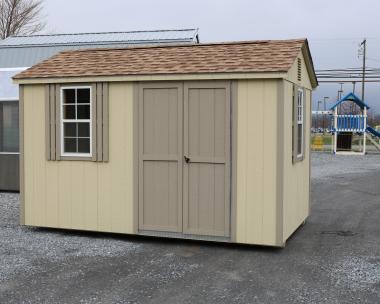 Pine Creek 8x12 HD Peak with Beige walls, PC Clay trim and PC Clay shutters, and Shakewood shingles