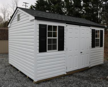 Pine Creek 10x14 HD Peak with White walls, White trim and Black shutters, and Charcoal shingles