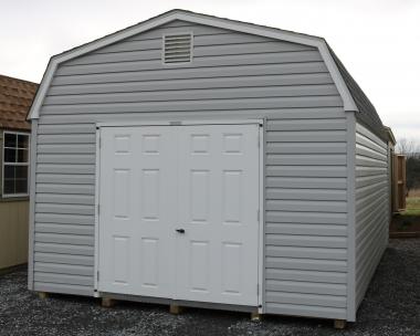 Pine Creek 12x20 HD Dutch Barn Barn with Harbor Stone walls, White trim and Black shutters, and Charcoal shingles